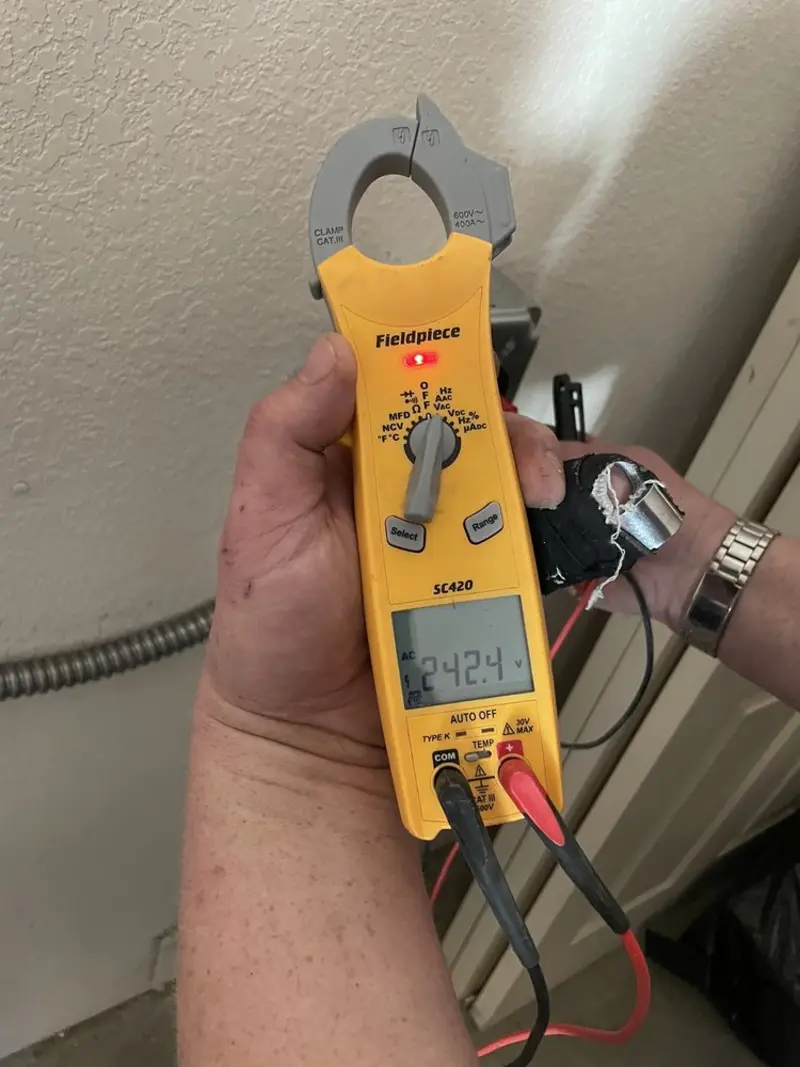 Voltage testing with clamp meter during Aluminum Wiring Replacement in Limerick
